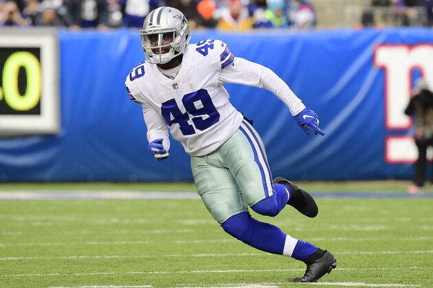 EAST RUTHERFORD, NEW JERSEY - DECEMBER 30:  Jamize Olawale #49 of the Dallas Cowboys in action against the New York Giants at MetLife Stadium on December 30, 2018 in East Rutherford, New Jersey. (Photo by Steven Ryan/Getty Images)