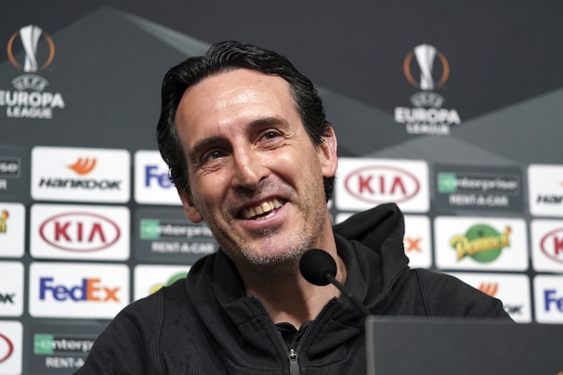 Arsenal's headcoach Unai Emery smiles a she answers journalists' questions during a press conference prior to Thursday's Europa League round of sixteen, 1st leg soccer match, between Rennes and Arsenal, Wednesday, March 6, 2019, in Rennes, western France. (AP Photo/David Vincent)