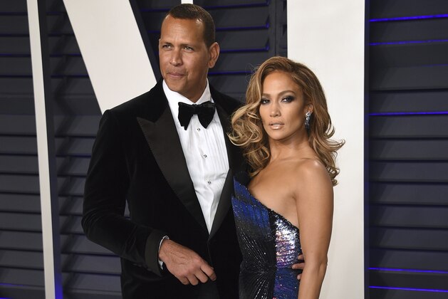 Alex Rodriguez, left, and Jennifer Lopez arrive at the Vanity Fair Oscar Party on Sunday, Feb. 24, 2019, in Beverly Hills, Calif. (Photo by Evan Agostini/Invision/AP)