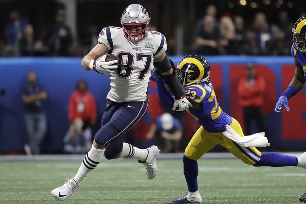 New England Patriots' Rob Gronkowski (87) runs against Los Angeles Rams' Nickell Robey-Coleman (23) during the first half of the NFL Super Bowl 53 football game Sunday, Feb. 3, 2019, in Atlanta. (AP Photo/Jeff Roberson)