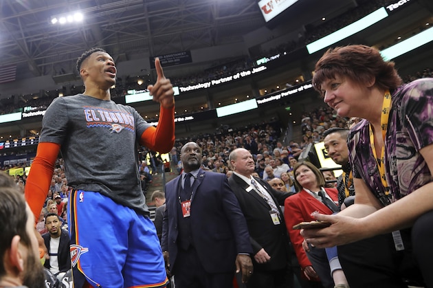 Oklahoma City Thunder's Russell Westbrook gets into a heated verbal altercation with fans in the first half of an NBA basketball game against the Utah Jazz, Monday, March 11, 2019, in Salt Lake City. (AP Photo/Rick Bowmer)