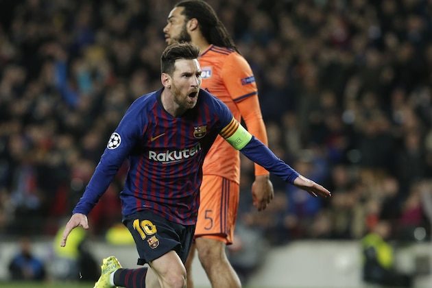 Barcelona's Argentinian forward Lionel Messi celebrates after scoring during the UEFA Champions League round of 16, second leg football match between FC Barcelona and Olympique Lyonnais at the Camp Nou stadium in Barcelona on March 13, 2019. (Photo by PAU BARRENA / AFP)        (Photo credit should read PAU BARRENA/AFP/Getty Images)