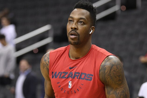 Washington Wizards center Dwight Howard shoots around before an NBA basketball game against the Miami Heat, Thursday, Oct. 18, 2018, in Washington. (AP Photo/Nick Wass)