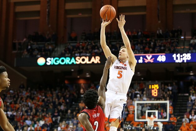 CHARLOTTESVILLE, VA - MARCH 09: Kyle Guy #5 of the Virginia Cavaliers shoots in the second half during a game against the Louisville Cardinals at John Paul Jones Arena on March 9, 2019 in Charlottesville, Virginia. (Photo by Ryan M. Kelly/Getty Images)