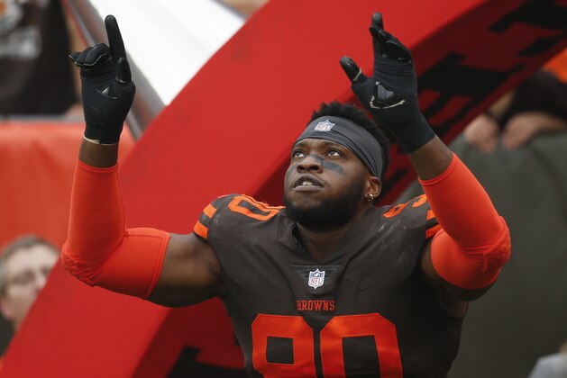 Cleveland Browns defensive end Emmanuel Ogbah (90) takes the field before an NFL football game against the Baltimore Ravens, Sunday, Oct. 7, 2018, in Cleveland. (AP Photo/Ron Schwane)
