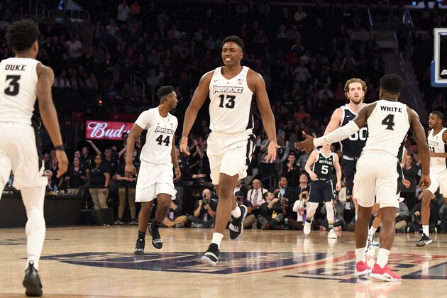 NEW YORK, NY - MARCH 13:  Kalif Young #13 of the Providence Friars runs down court celebrating a shot during the Big East Conference basketball first round game against the Butler Bulldogs at Madison Square Garden March 13, 2019 in New York City.  (Photo by Mitchell Layton/Getty Images)