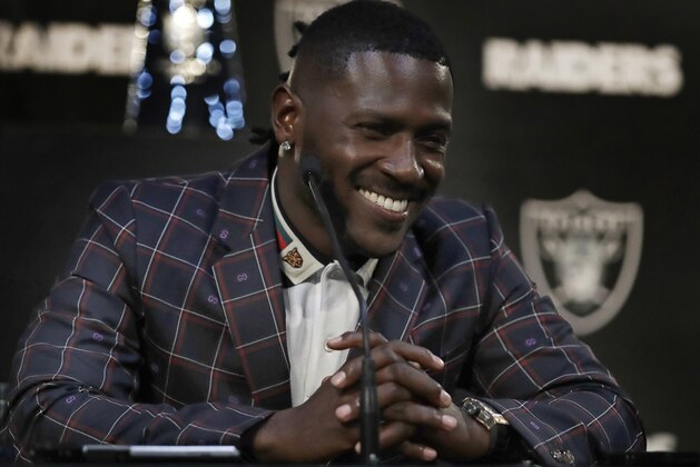 Oakland Raiders wide receiver Antonio Brown smiles during an NFL football news conference, Wednesday, March 13, 2019, in Alameda, Calif. (AP Photo/Ben Margot)