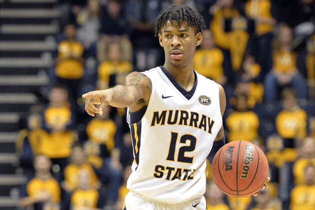 Murray State guard Ja Morant (12) directs the offense during the second half of an NCAA college basketball game against SIU Edwardsville in Murray, Ky., Saturday, Feb. 9, 2019. (AP Photo/Timothy D. Easley)