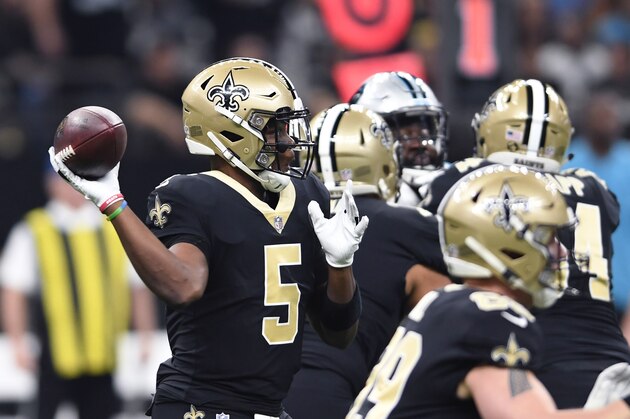New Orleans Saints quarterback Teddy Bridgewater (5) passes in the first half of an NFL football game against the Carolina Panthers in New Orleans, Sunday, Dec. 30, 2018. (AP Photo/Bill Feig)