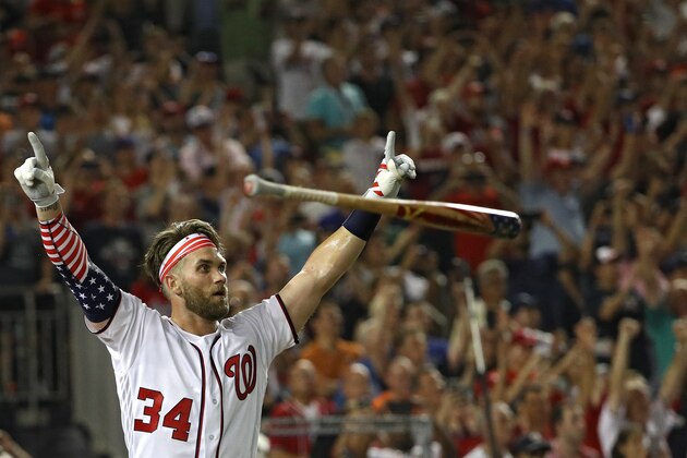 WASHINGTON, DC - JULY 16: Bryce Harper of the Washington Nationals and National League celebrates after winning the T-Mobile Home Run Derby at Nationals Park on July 16, 2018 in Washington, DC. Harper defeated Kyle Schwarber of the Chicago Cubs and National League 19-18. (Photo by Patrick Smith/Getty Images)