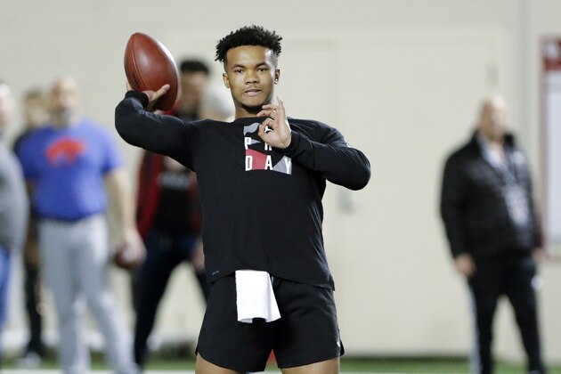Oklahoma quarterback Kyler Murray goes through passing drills at the university's Pro Day for NFL scouts in Norman, Okla., Wednesday, March 13, 2019. (AP Photo/Alonzo Adams)
