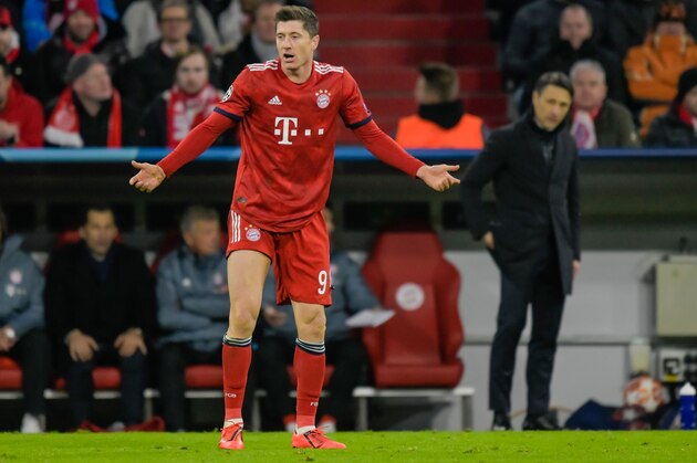 Bayern Munich's Polish forward Robert Lewandowski reacts during the UEFA Champions League, last 16, second leg football match Bayern Munich v Liverpool in Munich, southern Germany, on March 13, 2019. (Photo by GUENTER SCHIFFMANN / AFP)        (Photo credit should read GUENTER SCHIFFMANN/AFP/Getty Images)