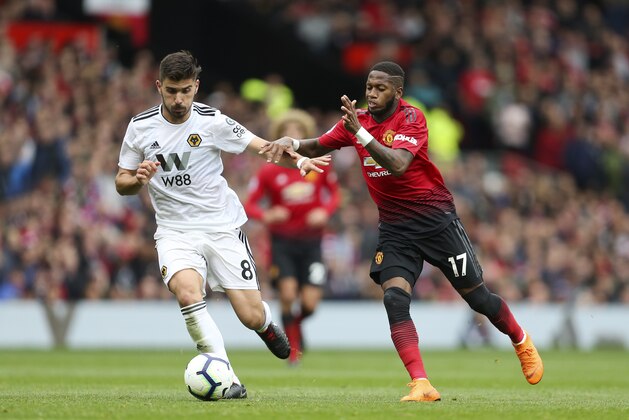 MANCHESTER, ENGLAND - SEPTEMBER 22: Ruben Neves of Wolverhampton Wanderers and Fred of Manchester United during the Premier League match between Manchester United and Wolverhampton Wanderers at Old Trafford on September 22, 2018 in Manchester, United Kingdom. (Photo by James Baylis - AMA/Getty Images)