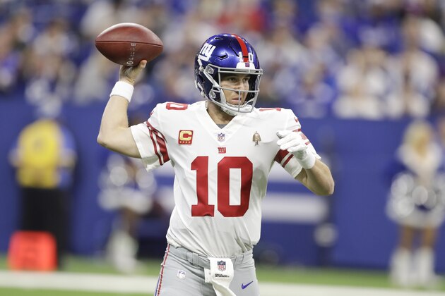 New York Giants quarterback Eli Manning (10) throws against the Indianapolis Colts during the first half of an NFL football game in Indianapolis, Sunday, Dec. 23, 2018. (AP Photo/Darron Cummings)
