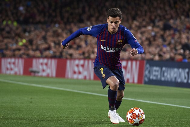 BARCELONA, SPAIN - MARCH 13: Philippe Coutinho of Barcelona runs with the ball during the UEFA Champions League Round of 16 Second Leg match between FC Barcelona and Olympique Lyonnais at Nou Camp on March 13, 2019 in Barcelona, . (Photo by Quality Sport Images/Getty Images)