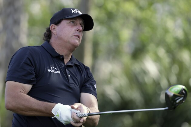 Phil Mickelson watches his tee shot on the 13th hole during the first round of The Players Championship golf tournament Thursday, March 14, 2019, in Ponte Vedra Beach, Fla. (AP Photo/Lynne Sladky)