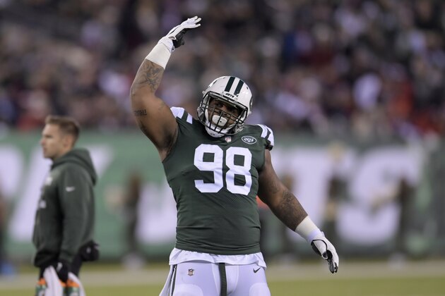 New York Jets defensive tackle Mike Pennel (98) gestures between plays against the Houston Texans during the second half of an NFL football game, Saturday, Dec. 15, 2018, in East Rutherford, N.J. (AP Photo/Bill Kostroun)