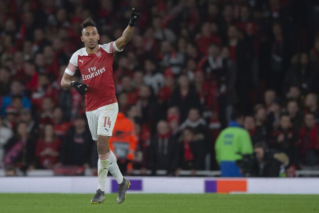 LONDON, ENGLAND - MARCH 14: Pierre-Emerick Aubameyang of Arsenal celebrates after scoring his team's third goal during the UEFA Europa League Round of 16 Second Leg match between Arsenal and Stade Rennes at Emirates Stadium on March 14, 2019 in London, United Kingdom. (Photo by TF-Images/Getty Images)