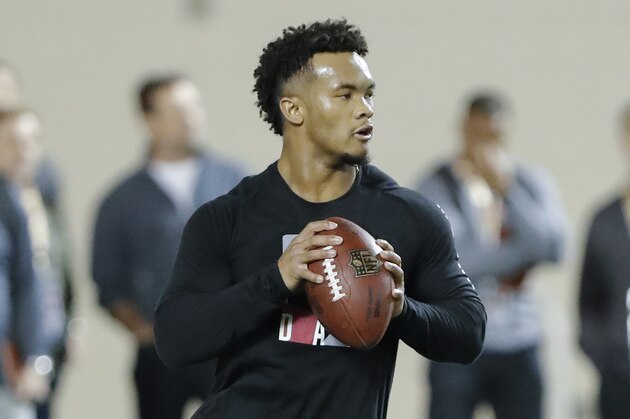 Oklahoma quarterback Kyler Murray goes through passing drills at the university's Pro Day for NFL scouts in Norman, Okla., Wednesday, March 13, 2019. (AP Photo/Alonzo Adams)