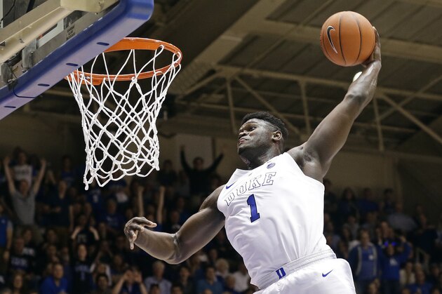 FILE - In this Jan. 5, 2019, file photo, Duke's Zion Williamson (1) dunks during the second half of an NCAA college basketball game against Clemson, in Durham, N.C. Williamson was named both The Associated Press ACC player and newcomer of the year, Tuesday, March 12, 2019. (AP Photo/Gerry Broome, File)