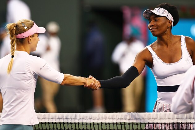 INDIAN WELLS, CALIFORNIA - MARCH 14:  Angelique  Kerber of Germany shakes hands at the net after her straight sets victory  against Venus Williams of the United States in their women's singles quarter final match on day eleven of the BNP Paribas Open at the Indian Wells Tennis Garden on March 14, 2019 in Indian Wells, California. (Photo by Clive Brunskill/Getty Images)