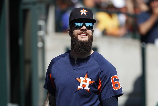 Houston Astros pitcher Dallas Keuchel watches in the second inning of a baseball game against the Detroit Tigers in Detroit, Wednesday, Sept. 12, 2018. (AP Photo/Paul Sancya)