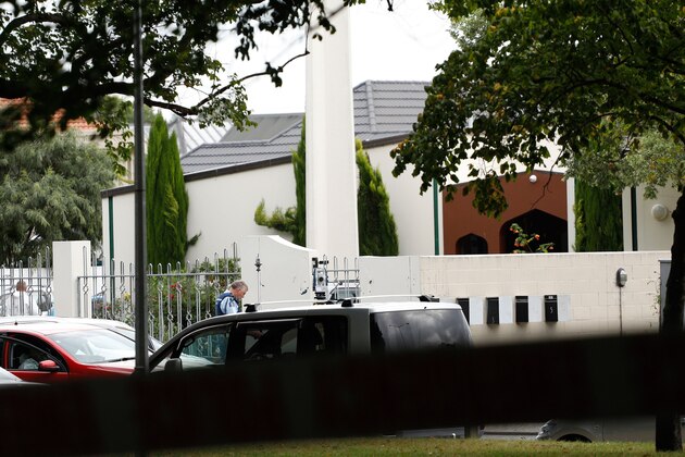 A security official stands guard outside the Masjid al Noor mosque after a shooting incident in Christchurch on March 15, 2019. - Attacks on two Christchurch mosques left at least 40 dead on March 15, with one gunman  identified as an Australian extremist -- apparently livestreaming the assault that triggered the lockdown of the New Zealand city. (Photo by Tessa BURROWS / AFP)        (Photo credit should read TESSA BURROWS/AFP/Getty Images)