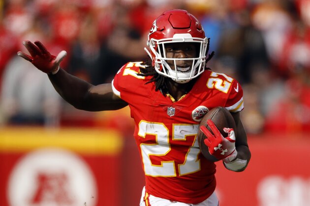Kansas City Chiefs running back Kareem Hunt (27) carries the ball during the first half of an NFL football game against the Arizona Cardinals in Kansas City, Mo., Sunday, Nov. 11, 2018. (AP Photo/Charlie Riedel)