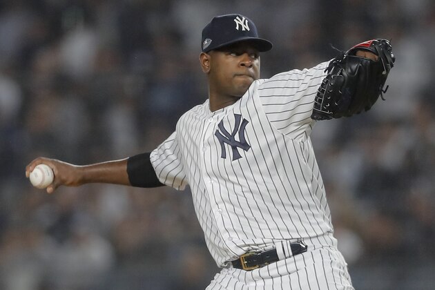 FILE - In this Oct. 8, 2018, file photo, New York Yankees starting pitcher Luis Severino delivers against the Boston Red Sox during the first inning of Game 3 of baseball's American League Division Series in New York. AL MVP Mookie Betts, NL Cy Young Award winner Jacob deGrom and major league home run champion Khris Davis reached high-priced one-year deals to avoid salary arbitration, while slugger Nolan Arenado and pitchers Gerrit Cole, Severino and Aaron Nola failed to reach agreements and for now appeared headed to hearings. (AP Photo/Julie Jacobson, File)