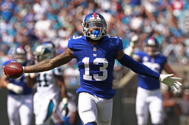FILE - In this Oct. 7, 2018, file photo, New York Giants' Odell Beckham Jr. celebrates a catch against the Carolina Panthers during the first half of an NFL football game in Charlotte, N.C. Two people familiar with the blockbuster trade say the Cleveland Browns have agreed to acquire Beckham from the Giants. (AP Photo/Jason E. Miczek, File)