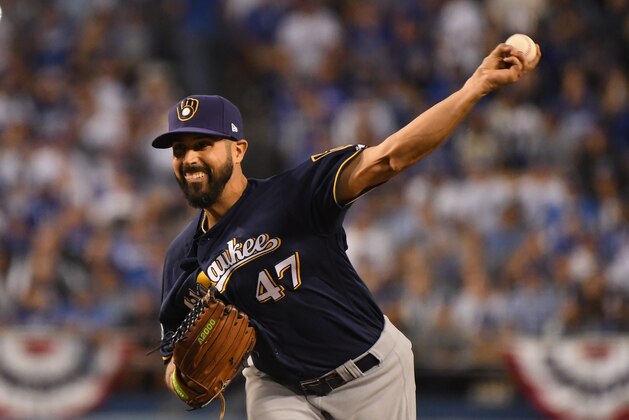 LOS ANGELES, CA - OCTOBER 16:  Pitcher Gio Gonzalez #47 of the Milwaukee Brewers pitches during the first inning of Game Four of the National League Championship Series against the Los Angeles Dodgers at Dodger Stadium on October 16, 2018 in Los Angeles, California.  (Photo by Harry How/Getty Images)