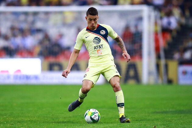 MEXICO CITY, MEXICO - MARCH 09: Mateus Uribe #8 of America drives the ball during a 10th round match between America and Puebla as part of Torneo Clausura 2019 Liga MX at Azteca Stadium on March 9, 2019 in Mexico City, Mexico. (Photo by Hector Vivas/Getty Images)