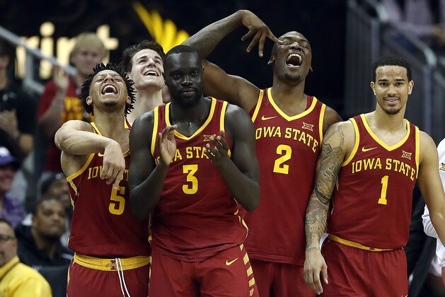 KANSAS CITY, MISSOURI - MARCH 14:  Lindell Wigginton #5, Marial Shayok #3, Cameron Lard #2, and Nick Weiler-Babb #1 of the Iowa State Cyclones react from the bench during the quarterfinal game of the Big 12 Basketball Tournament against the Baylor Bears at Sprint Center on March 14, 2019 in Kansas City, Missouri. (Photo by Jamie Squire/Getty Images)