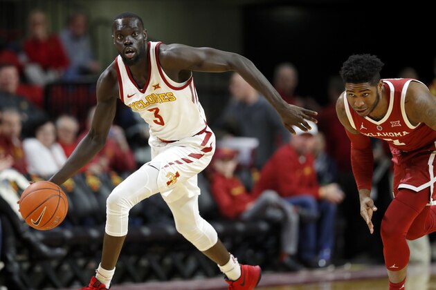 Iowa State guard Marial Shayok, left, steals the ball from Oklahoma guard Rashard Odomes, right, during the second half of an NCAA college basketball game, Monday, Feb. 25, 2019, in Ames, Iowa. (AP Photo/Charlie Neibergall)