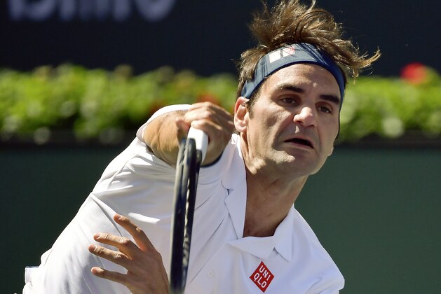 Roger Federer, of Switzerland, serves to Hubert Hurkacz, of Poland, at the BNP Paribas Open tennis tournament Friday, March 15, 2019, in Indian Wells, Calif. Federer won 6-4, 6-4. (AP Photo/Mark J. Terrill)