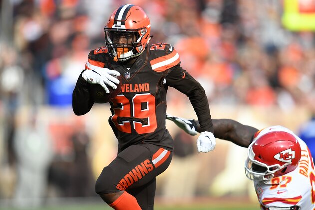 CLEVELAND, OH - NOVEMBER 04:  Duke Johnson #29 of the Cleveland Browns avoids a tackle by Allen Bailey #97 of the Kansas City Chiefs during the second quarter at FirstEnergy Stadium on November 4, 2018 in Cleveland, Ohio. (Photo by Jason Miller/Getty Images)