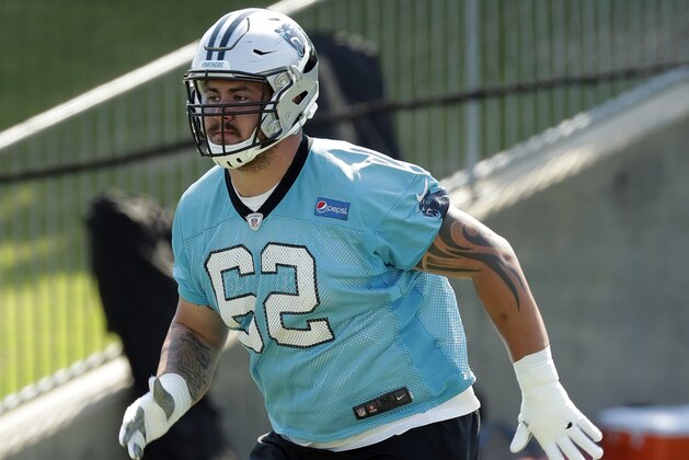 Carolina Panthers' Taylor Hearn (62) runs a drill during the NFL football team's rookie camp in Charlotte, N.C., Saturday, May 12, 2018. (AP Photo/Chuck Burton)