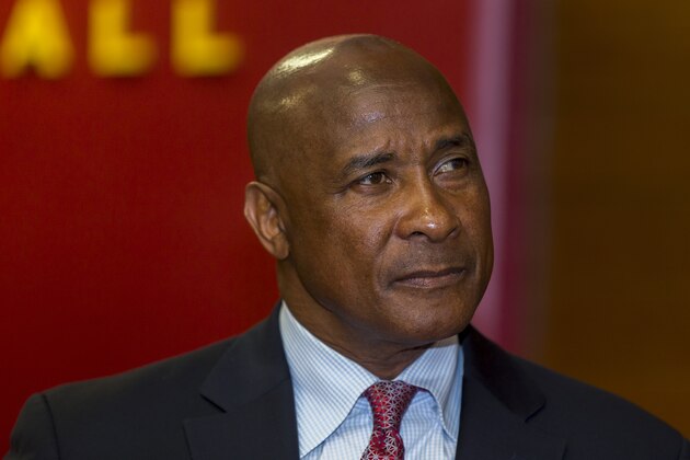 University of Southern California's new athletic director, Lynn Swann pauses during is appointment news conference at the USC campus in Los Angeles, Thursday, April 14, 2016. Although Swann has no experience in high-level collegiate athletic administration, he is the third straight former USC football player to take the post. The former wide receiver, a Pro Football Hall of Famer, will succeed Pat Haden on July 1. (AP Photo/Damian Dovarganes)