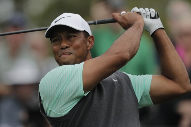Tiger Woods hits off the fourth tee during the third round of The Players Championship golf tournament Saturday, March 16, 2019, in Ponte Vedra Beach, Fla. (AP Photo/Gerald Herbert)