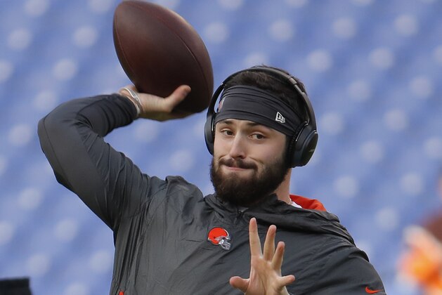 Cleveland Browns quarterback Baker Mayfield warms up before an NFL football game against the Baltimore Ravens, Sunday, Dec. 30, 2018, in Baltimore. (AP Photo/Carolyn Kaster)
