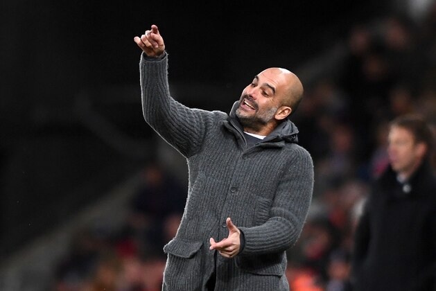 SWANSEA, WALES - MARCH 16: Josep Guardiola, Manager of Manchester City reacts during the FA Cup Quarter Final match between Swansea City and Manchester City at Liberty Stadium on March 16, 2019 in Swansea, United Kingdom. (Photo by Harry Trump/Getty Images) SWANSEA, WALES - MARCH 16: Josep Guardiola, Manager of Manchester City reacts during the FA Cup Quarter Final match between Swansea City and Manchester City at Liberty Stadium on March 16, 2019 in Swansea, United Kingdom. (Photo by Harry Trump/Getty Images)