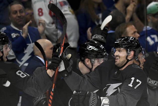 Tampa Bay Lightning left wing Alex Killorn (17) celebrates his third goal of the night during the third period of an NHL hockey game against the Washington Capitals Saturday, March 16, 2019, in Tampa, Fla. (AP Photo/Jason Behnken)