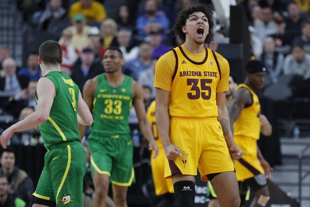 Arizona State's Taeshon Cherry (35) celebrates after a play against Oregon during the first half of an NCAA college basketball game in the semifinals of the Pac-12 men's tournament Friday, March 15, 2019, in Las Vegas. (AP Photo/John Locher)