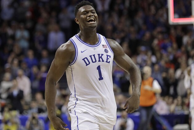 Duke's Zion Williamson (1) celebrates after Duke defeated Florida State in the NCAA college basketball championship game of the Atlantic Coast Conference tournament in Charlotte, N.C., Saturday, March 16, 2019. (AP Photo/Nell Redmond)