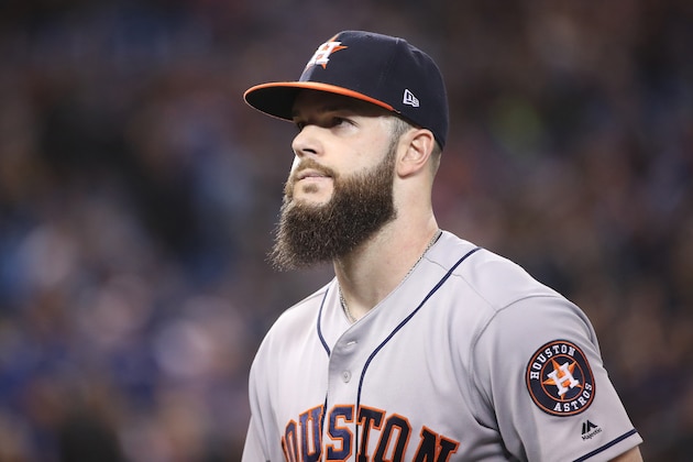 TORONTO, ON - SEPTEMBER 24: Dallas Keuchel #60 of the Houston Astros walks to the dugout after getting the last out of the fourth inning during MLB game action against the Toronto Blue Jays at Rogers Centre on September 24, 2018 in Toronto, Canada. (Photo by Tom Szczerbowski/Getty Images)