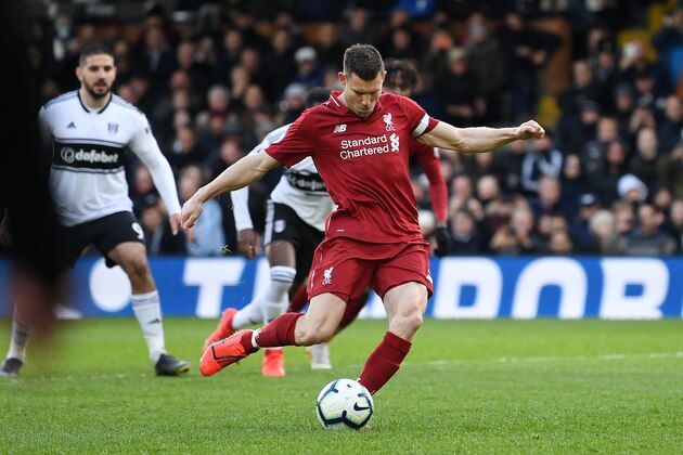 LONDON, ENGLAND - MARCH 17:  James Milner of Liverpool scores his sides second goal from the penalty spot  during the Premier League match between Fulham FC and Liverpool FC at Craven Cottage on March 17, 2019 in London, United Kingdom. (Photo by Michael Regan/Getty Images)