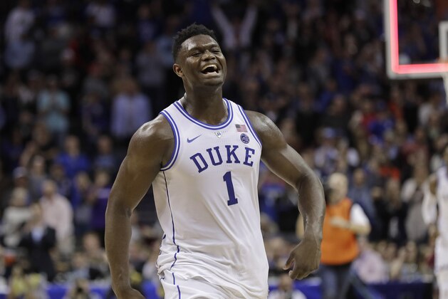 Duke's Zion Williamson (1) celebrates after Duke defeated Florida State in the NCAA college basketball championship game of the Atlantic Coast Conference tournament in Charlotte, N.C., Saturday, March 16, 2019. (AP Photo/Nell Redmond)