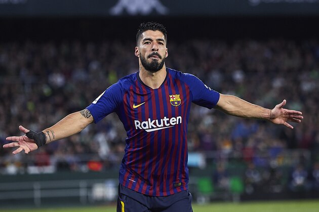 SEVILLE, SPAIN - MARCH 17: Luis Suarez of FC Barcelona celebrates scoring his team's third goal during the La Liga match between Real Betis Balompie and FC Barcelona at Estadio Benito Villamarin on March 17, 2019 in Seville, Spain. (Photo by Quality Sport Images/Getty Images)