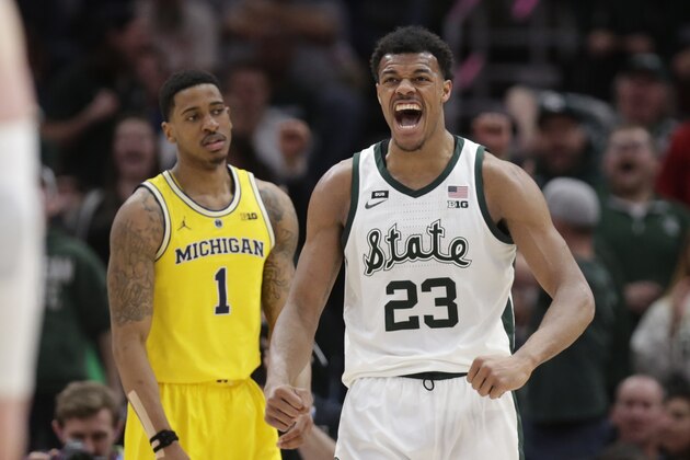 Michigan State's Xavier Tillman (23) reacts during the second half of an NCAA college basketball championship game against Michigan in the Big Ten Conference tournament, Sunday, March 17, 2019, in Chicago. (AP Photo/Kiichiro Sato)