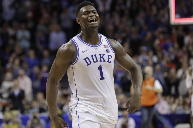 Duke's Zion Williamson (1) celebrates after Duke defeated Florida State in the NCAA college basketball championship game of the Atlantic Coast Conference tournament in Charlotte, N.C., Saturday, March 16, 2019. (AP Photo/Nell Redmond)